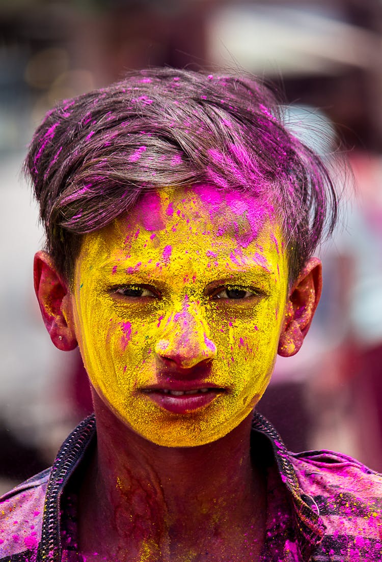 Man With Colorful Powder On His Face