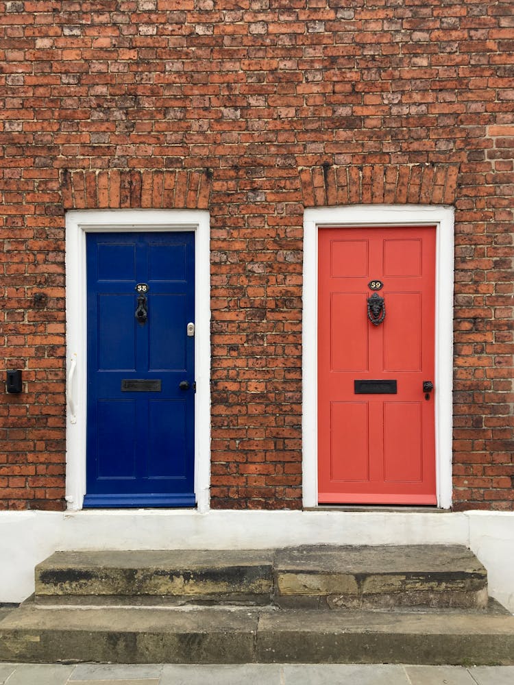 Photo Of Blue And Red Doors 