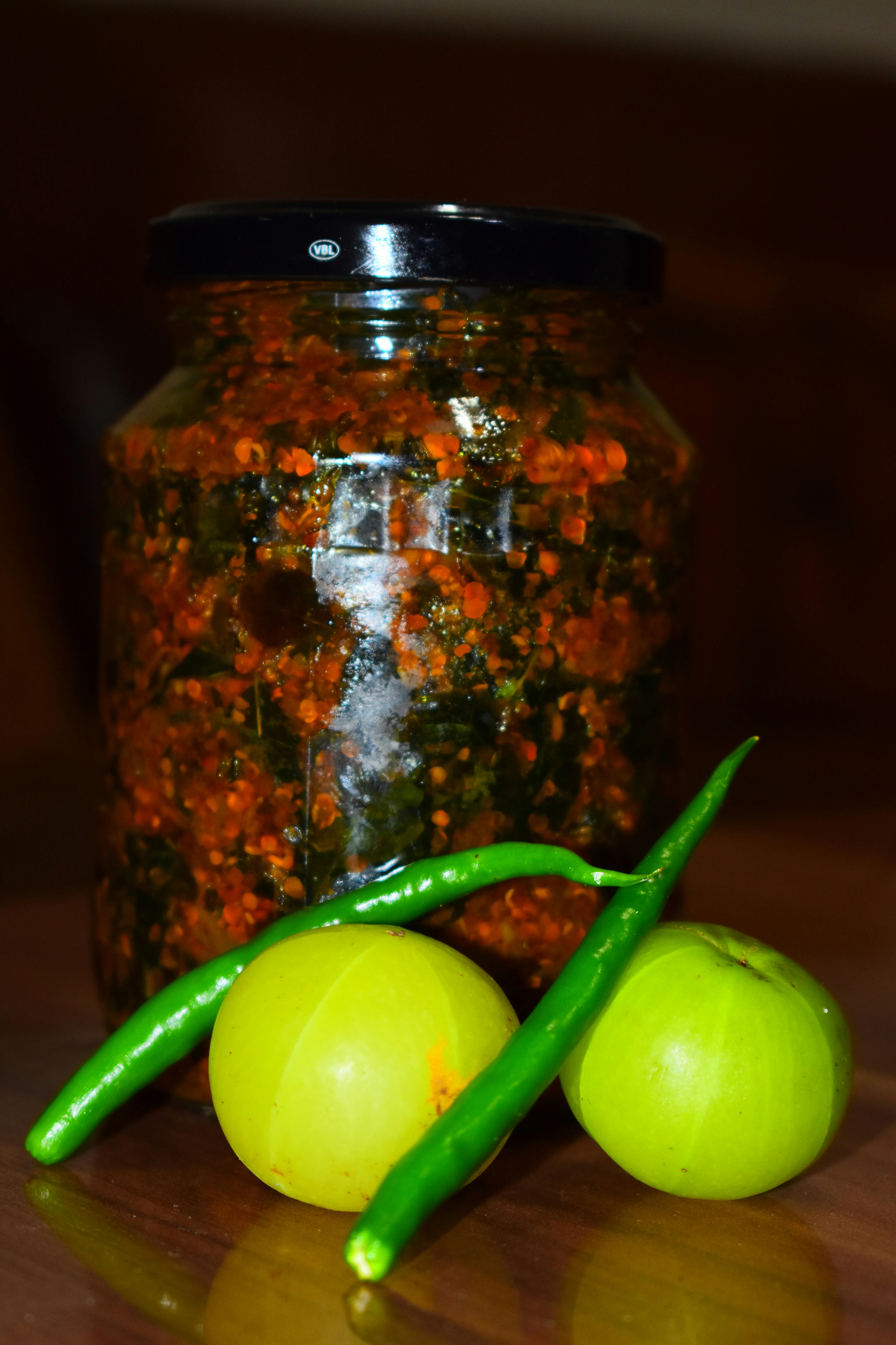 Free stock photo of glass jar, gooseberry, green chillies