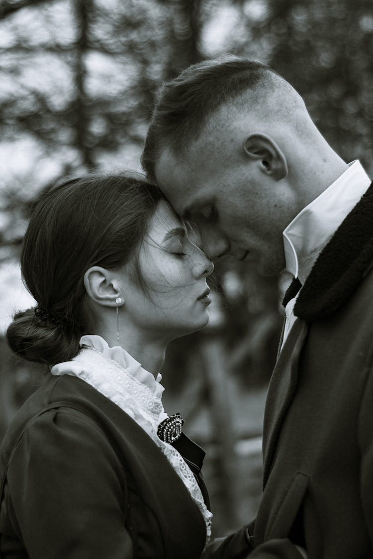 Couple In Love Touching With Foreheads