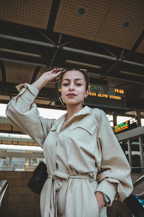 Woman in Beige Button Up Shirt Smiling