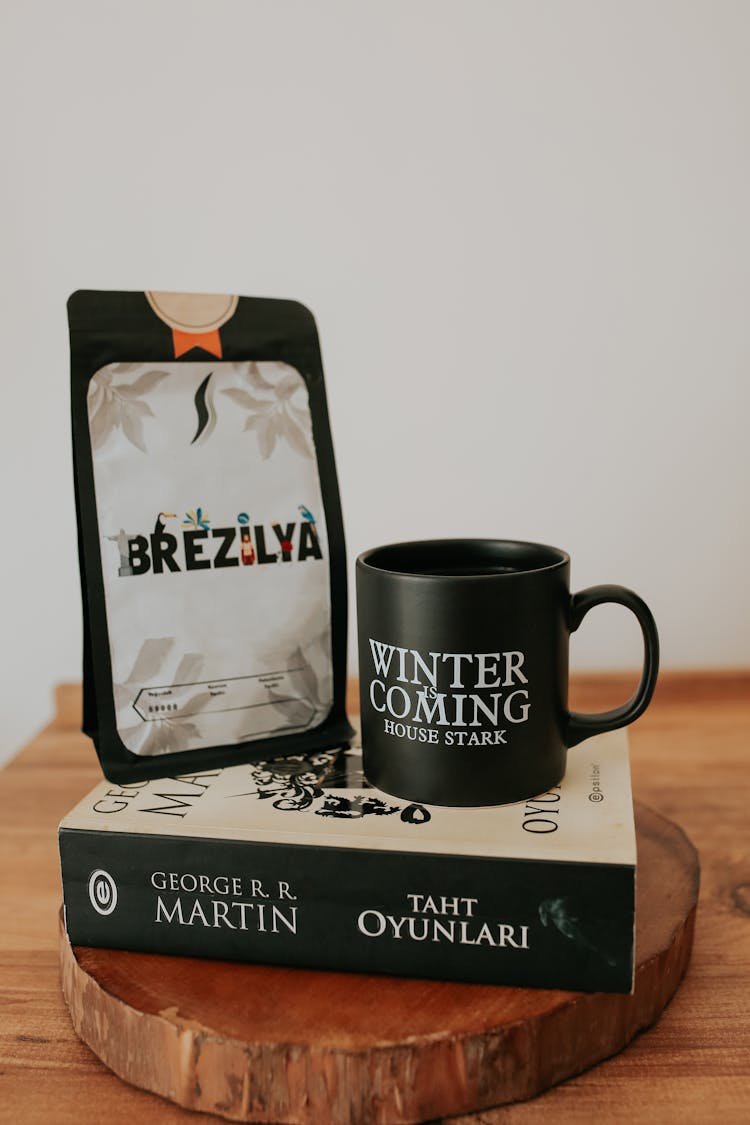 Coffee Bag And Mug On Book