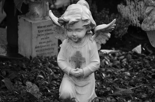 Grayscale Photo of Angel Statue