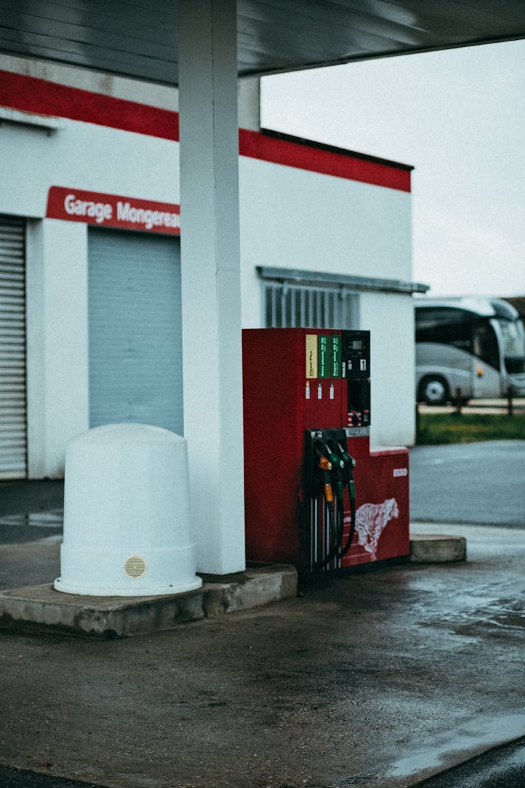 Red Gas Pump On A Gas Station