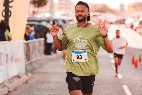Безкоштовне стокове фото на тему «афроамериканський чоловік, біжить, змагання» стокове фото
