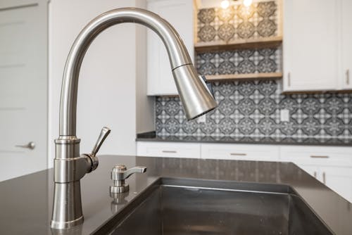 Stainless Steel Faucet on the Sink