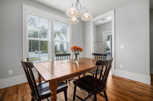 Wooden Table and Chairs at a Dining Room