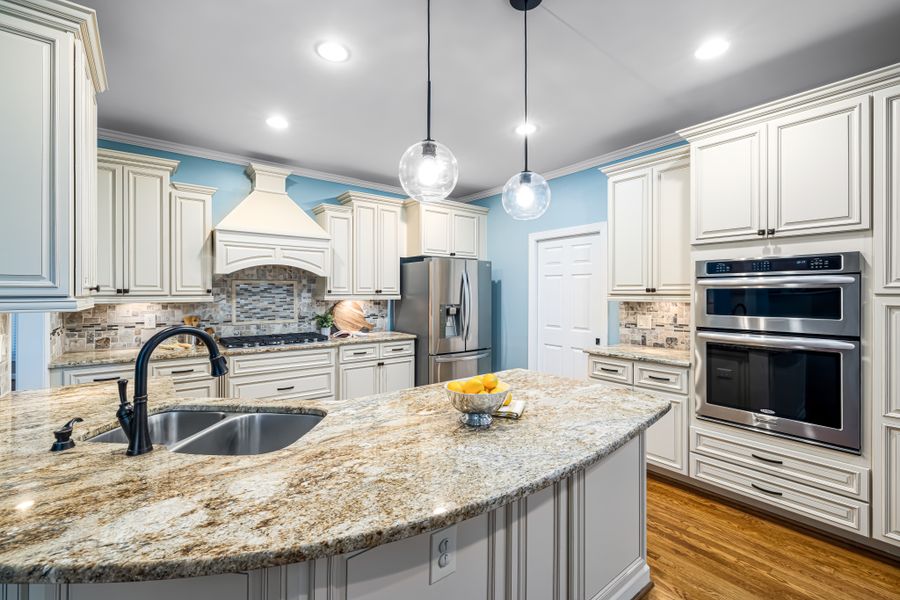 Quartz countertop and full-height backsplash installation in a remodeled Irvine kitchen
