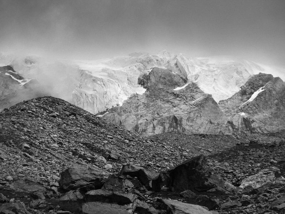 Grayscale Photo of Mountains