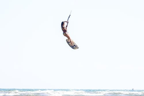 Gratis Immagine gratuita di donna, kiteboarder, kiteboarding Foto a disposizione