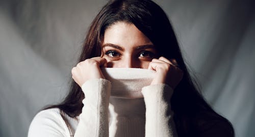 Free Close-up Photo of Woman wearing White Turtleneck Sweater  Stock Photo