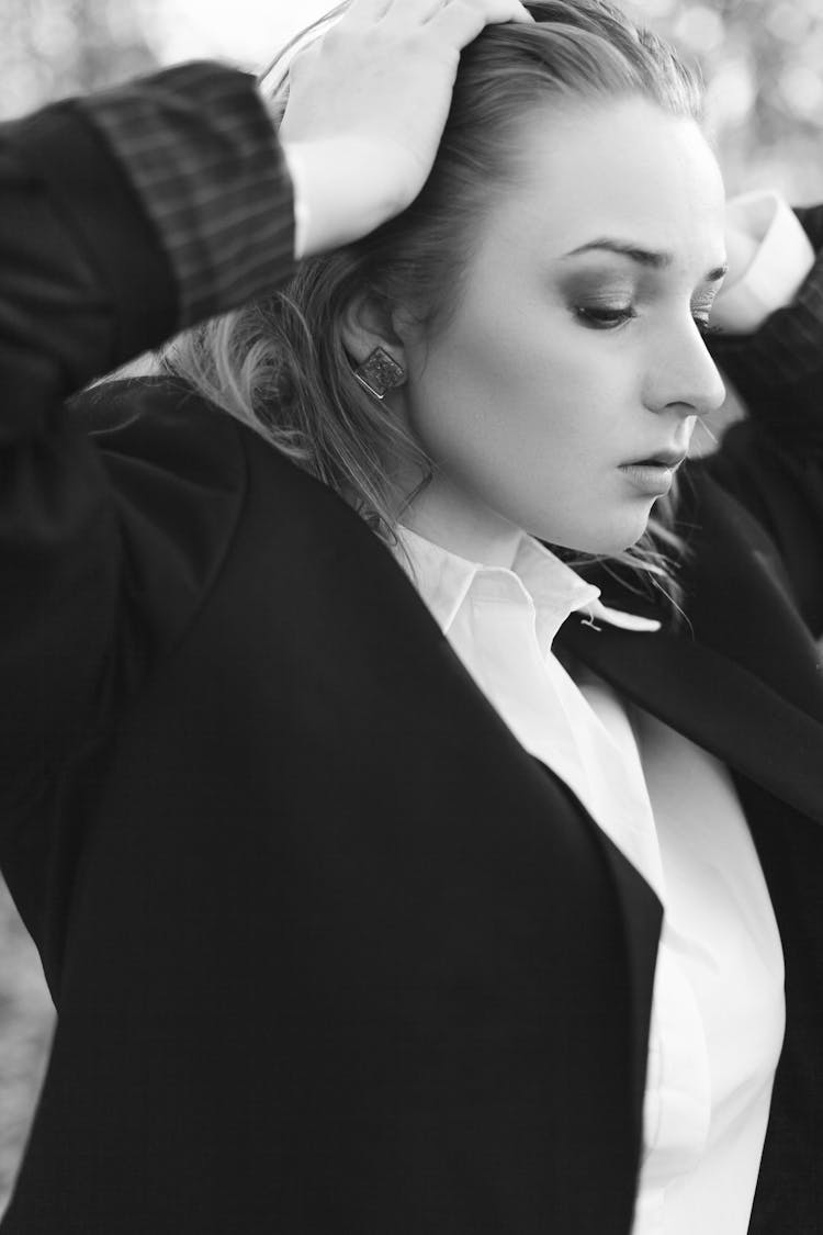 Black And White Portrait Of Woman In Suit