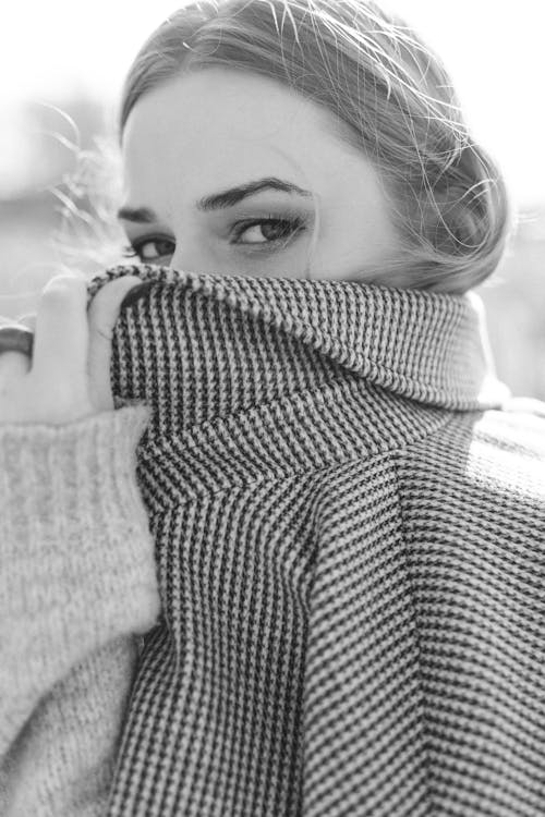 Free Woman Covering Face with Collar Stock Photo