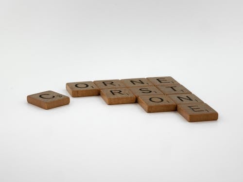 Free Close-up Photo of Wooden Scrabble Pieces Stock Photo