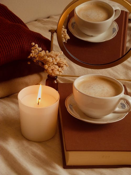 Close up of a Coffee and a Candle