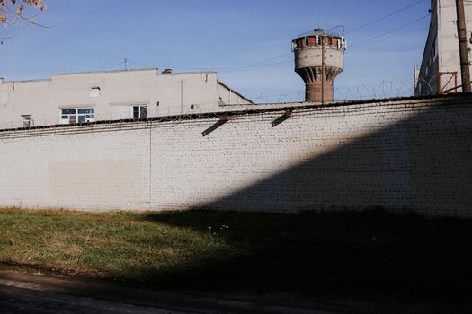 Prison Wall With a Lookout Tower Behind