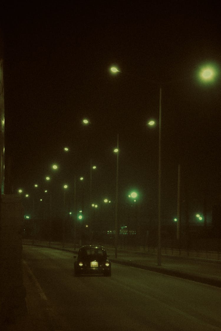 Car On Illuminated Street