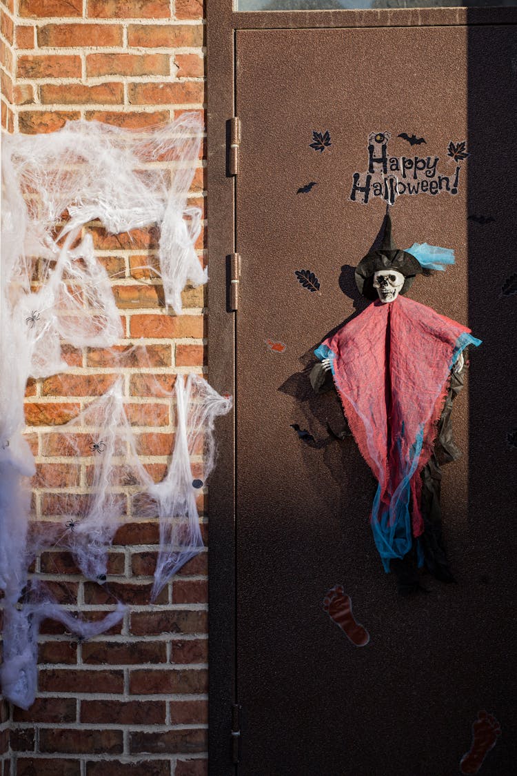 Photograph Of A Door With Halloween Decorations