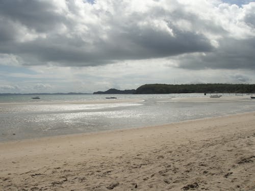 Kostenloses Stock Foto zu areia, céu azul, horizont