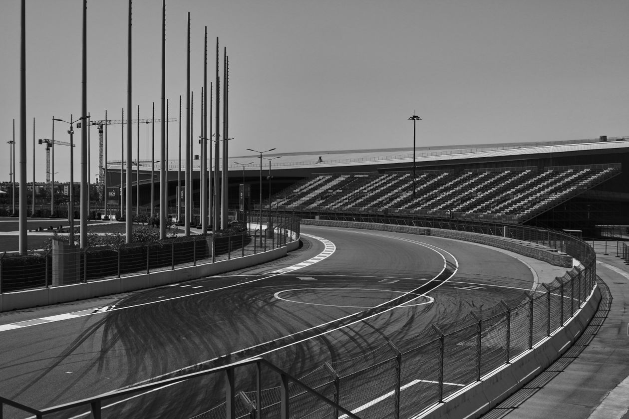 An empty race track and grandstand