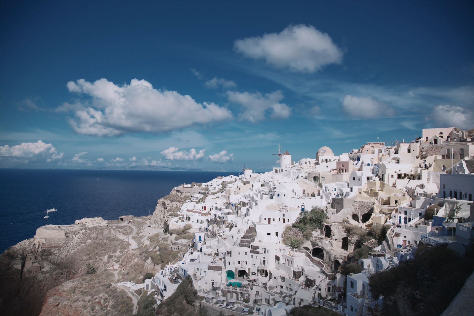 Santorini Oia white houses blue domes caldera sunset