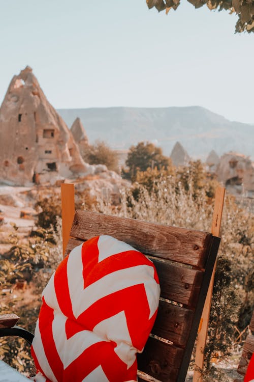 Throw Pillow on a Wooden Chair