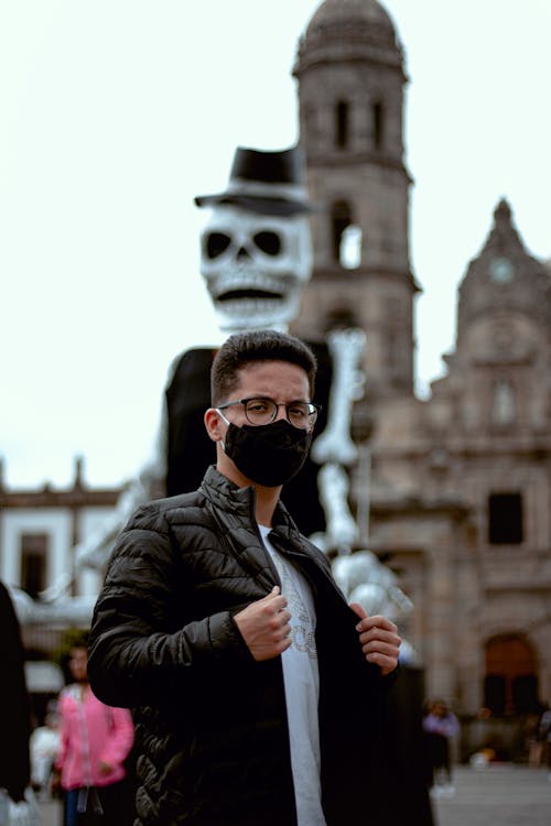 Man in Black Jacket Wearing Face Mask