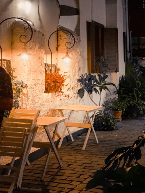 Outdoor Cafe Furniture Illuminated at Night