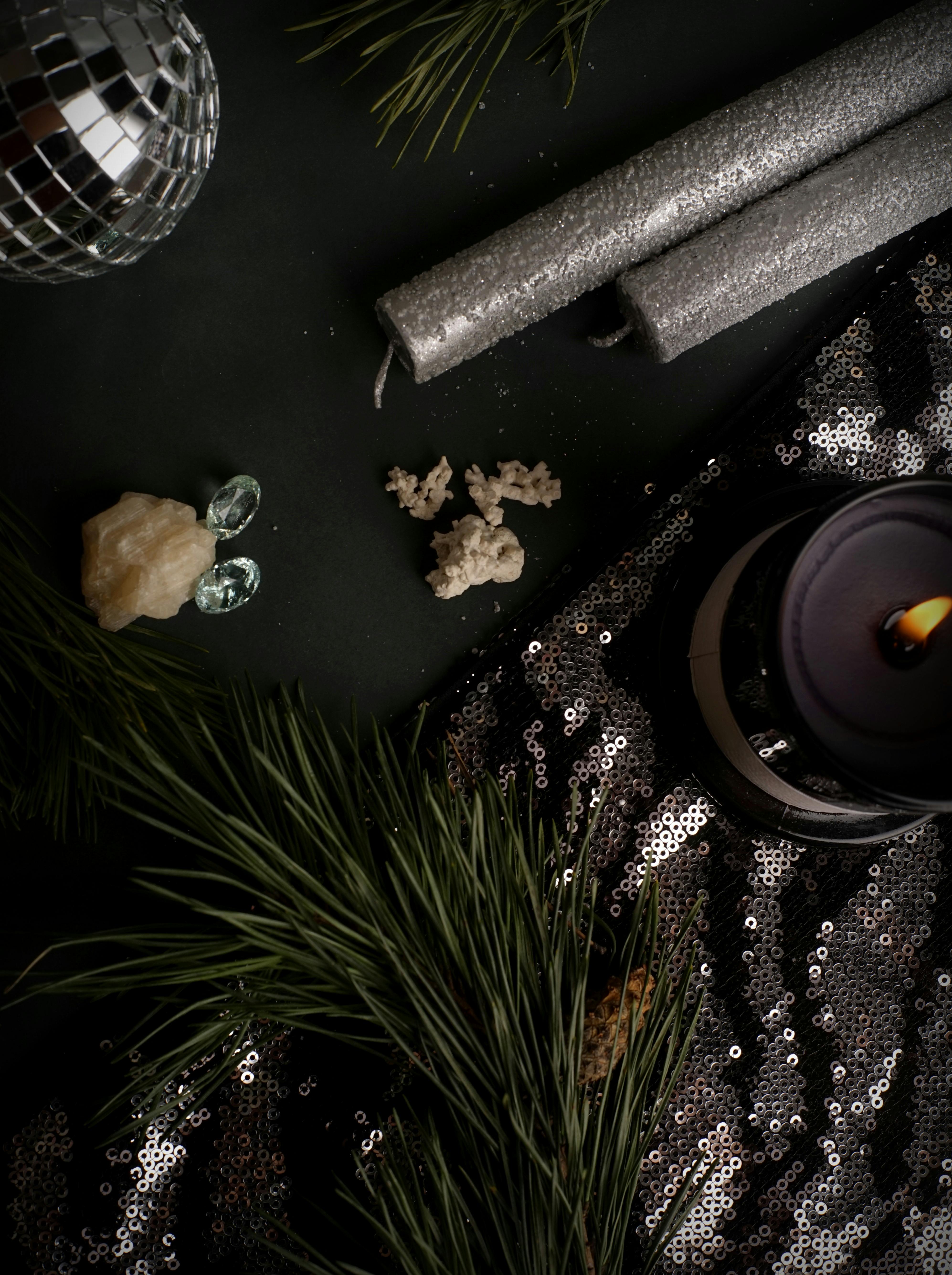 Disco Ball, Candles, Sequins, Minerals and Some Plants · Free Stock Photo