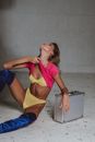 Woman Taking off T-shirt