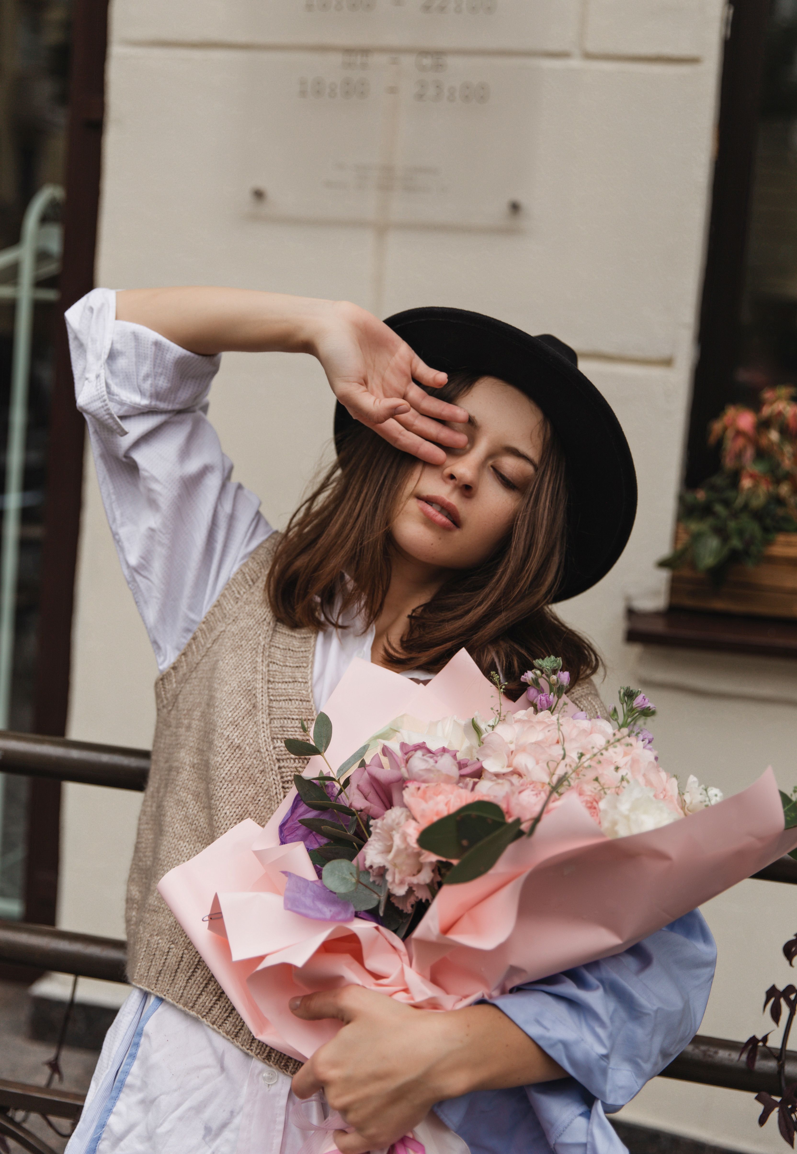 Woman Holding Flowers Bouquet · Free Stock Photo