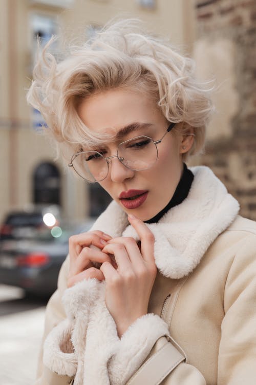 Portrait of Blond Haired Woman with Eyeglasses