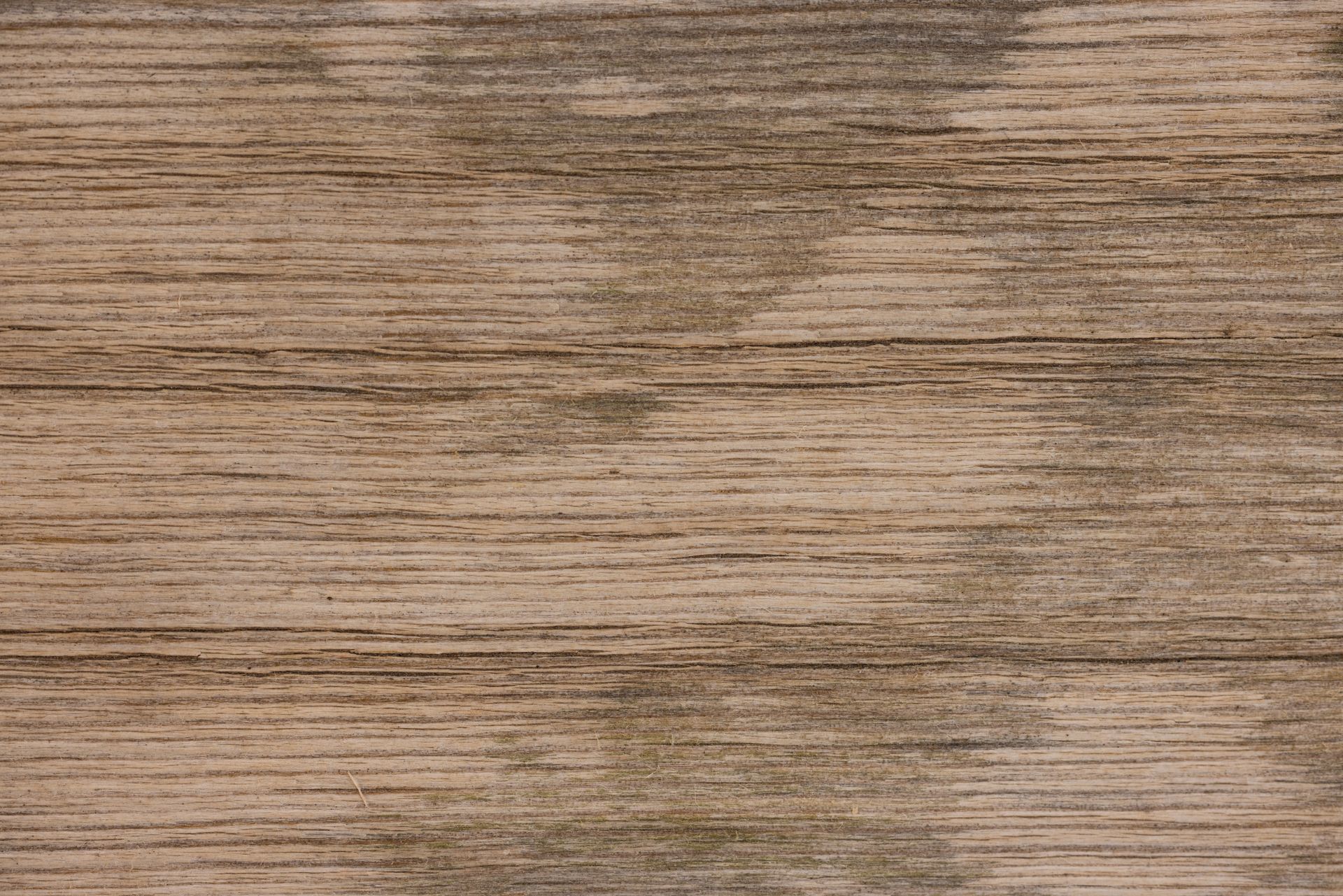 Brown Wooden Surface with Cracks and Stains