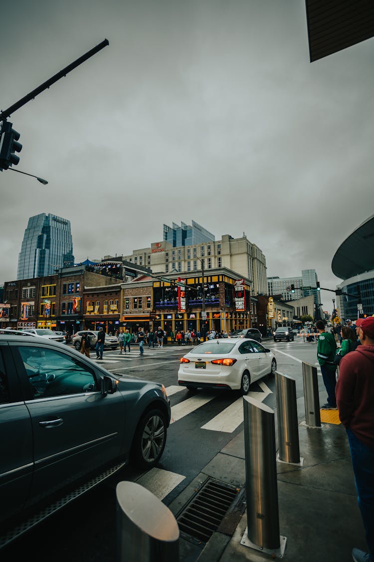 City Street With Cars And Modern Architecture