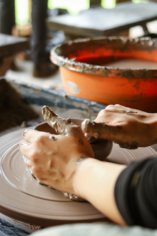 Photo of Person Doing Pottery