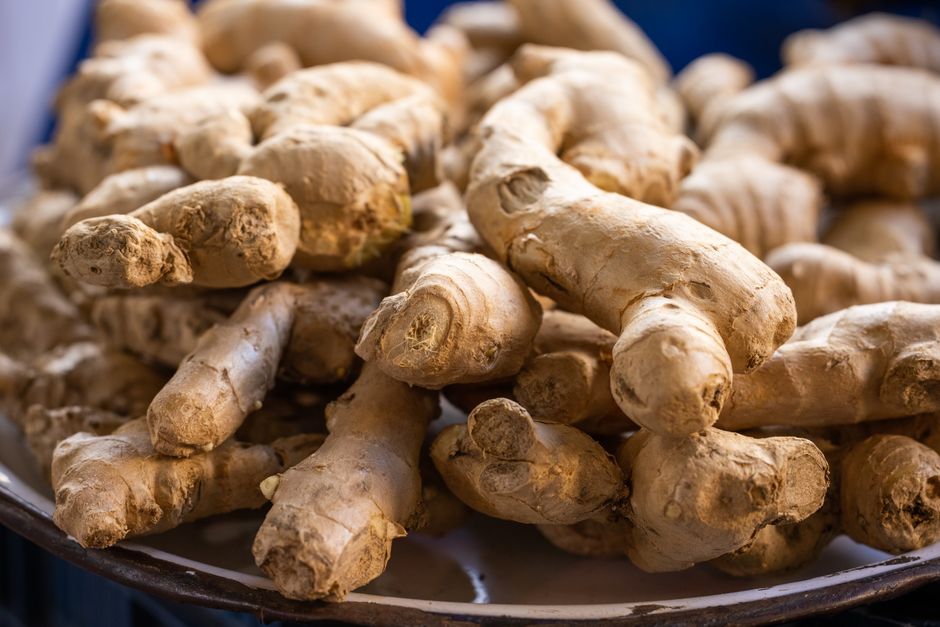Assortment of anti-inflammatory foods like berries, nuts, and leafy greens