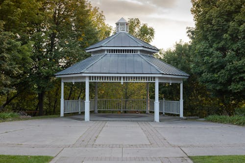 Wooden Gazebo Between Trees
