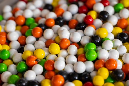 Free A vibrant close-up of colorful round gumballs, showcasing a mix of sweet treats. Stock Photo