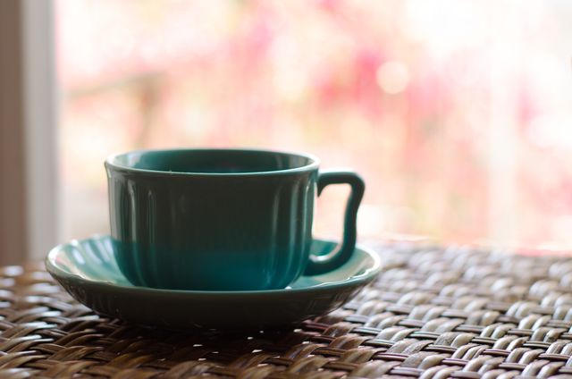 Coffee cup and props arranged on a table — photo by Julia Sakelli on Pexels