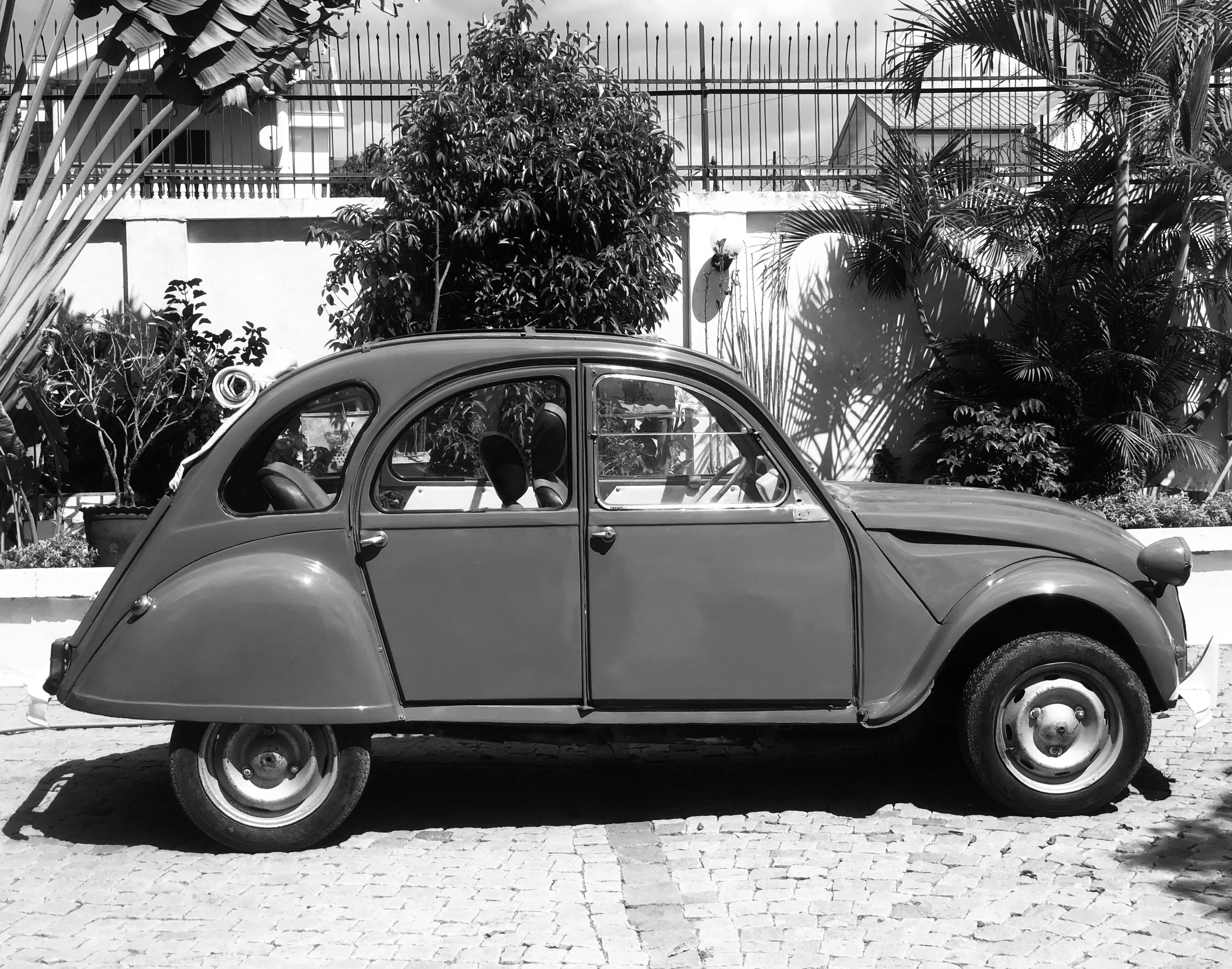 Grayscale Photo of a Classic Car · Free Stock Photo