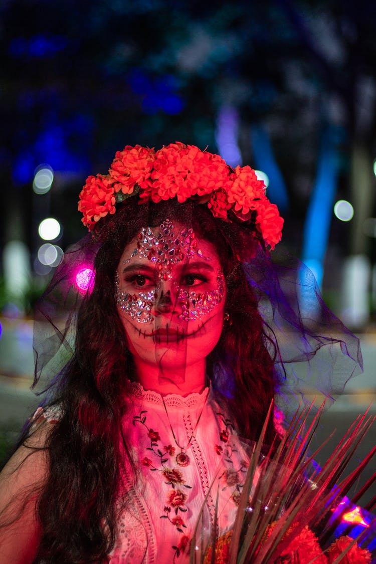 Brunette Wearing Flower Crown And Dia De Los Muertos Makeup