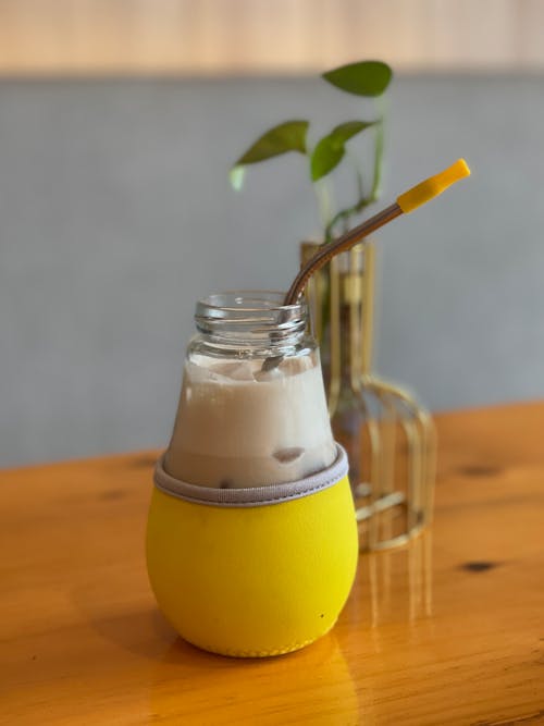 Free Earl Grey Milk Tea Beverage on Wooden Table Stock Photo