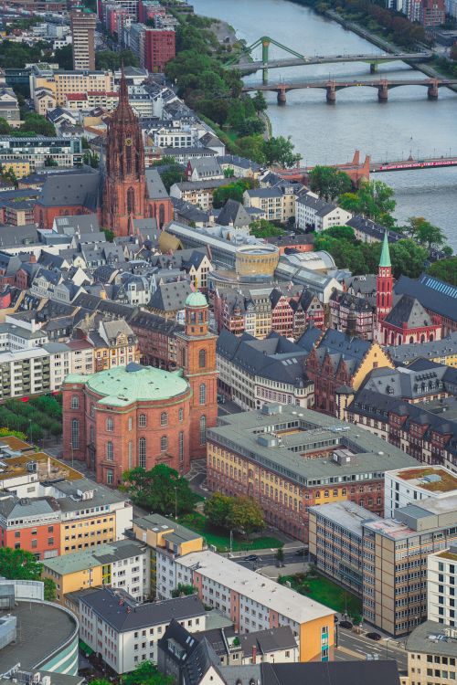 Free Explore Frankfurt's historic old town from above, showcasing iconic architecture and scenic river views. Stock Photo
