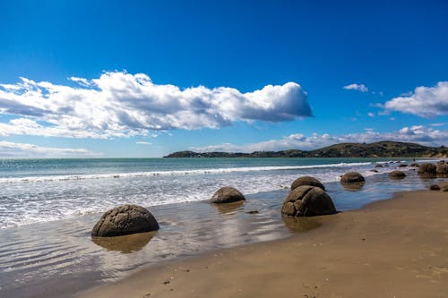 Brown Rock Formation on Seashore