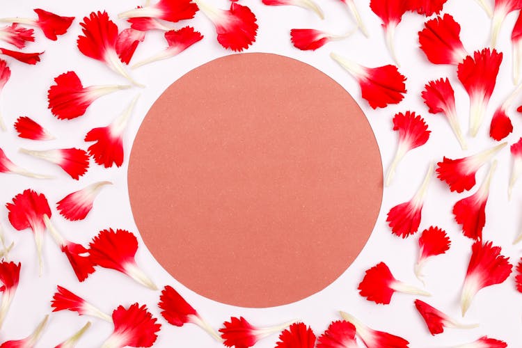 Red Circle And Pattern With Red Petals