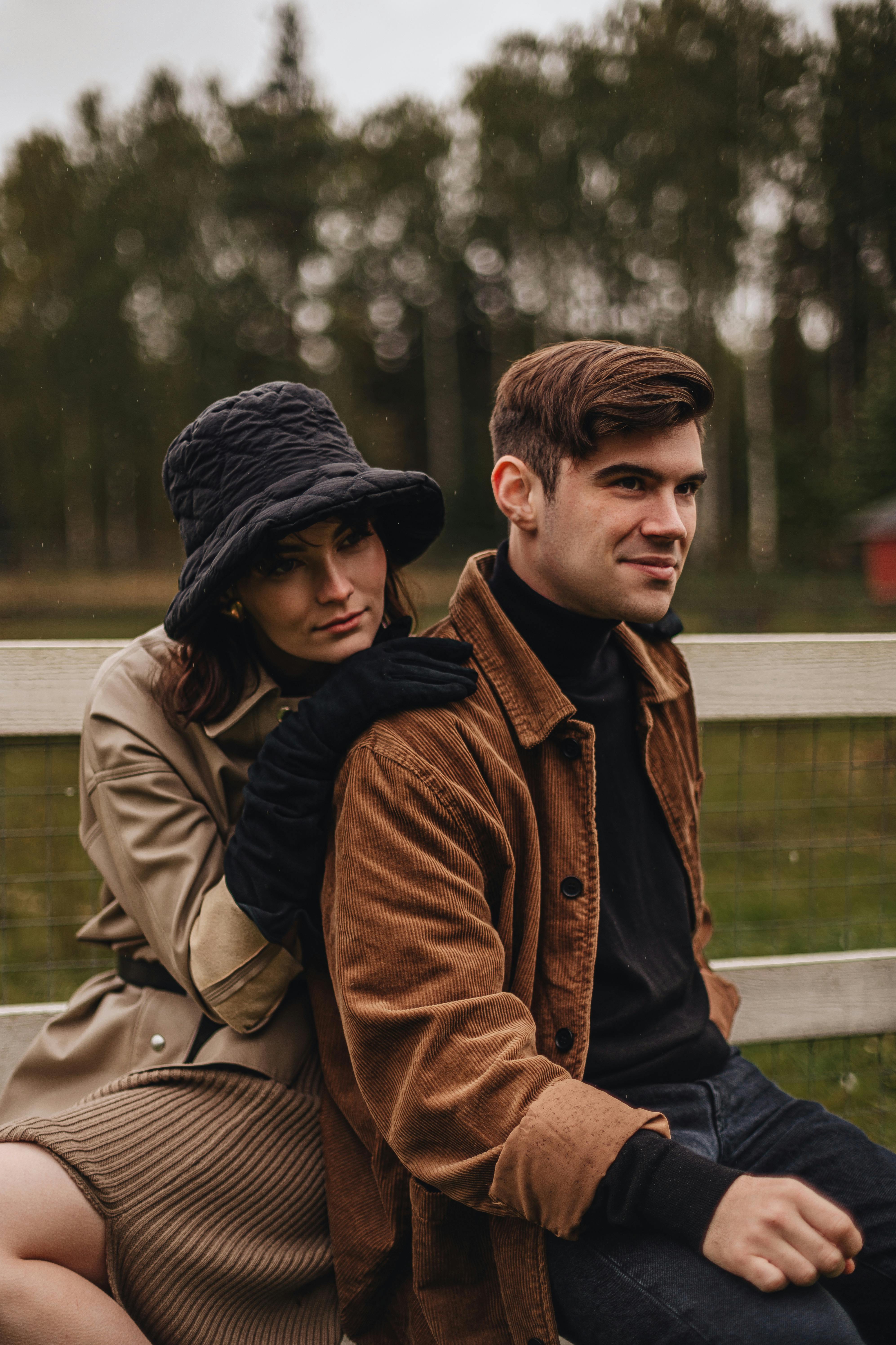 Man and Woman Hanging from Roof · Free Stock Photo