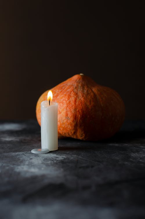 Halloween Still Life with Pumpkin and Candle