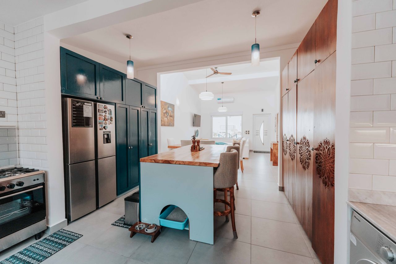 A kitchen island with cabinetry built into its base