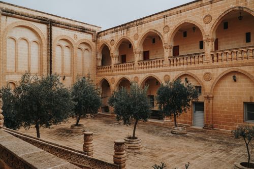 Free Explore the ancient architecture of Mor Gabriel Monastery's courtyard in Mardin, Turkey. Stock Photo