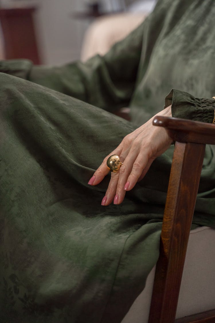 Elderly Woman Sitting And The Ring On Her Hand